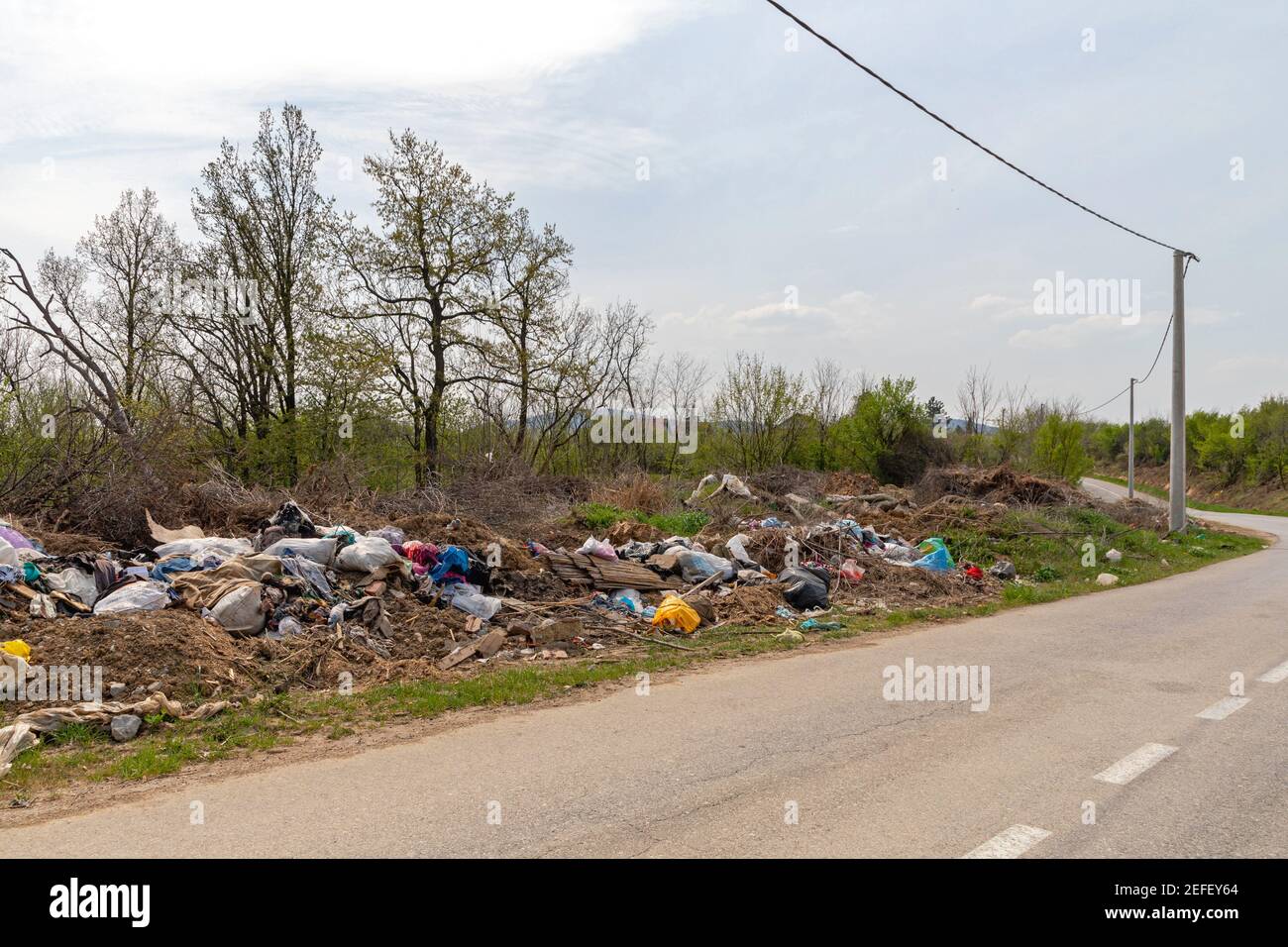 Illegal Dump Site at Side of Road Environment Pollution Problems Stock Photo