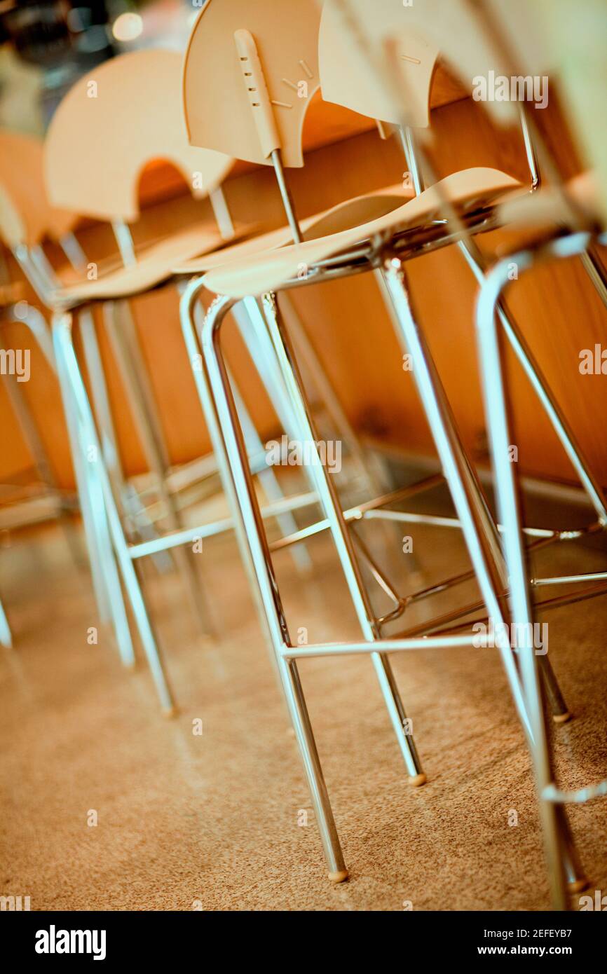 Close-up of chairs in a row Stock Photo