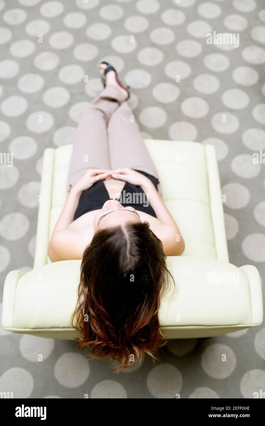 Woman sitting on chair from above hi-res stock photography and images ...