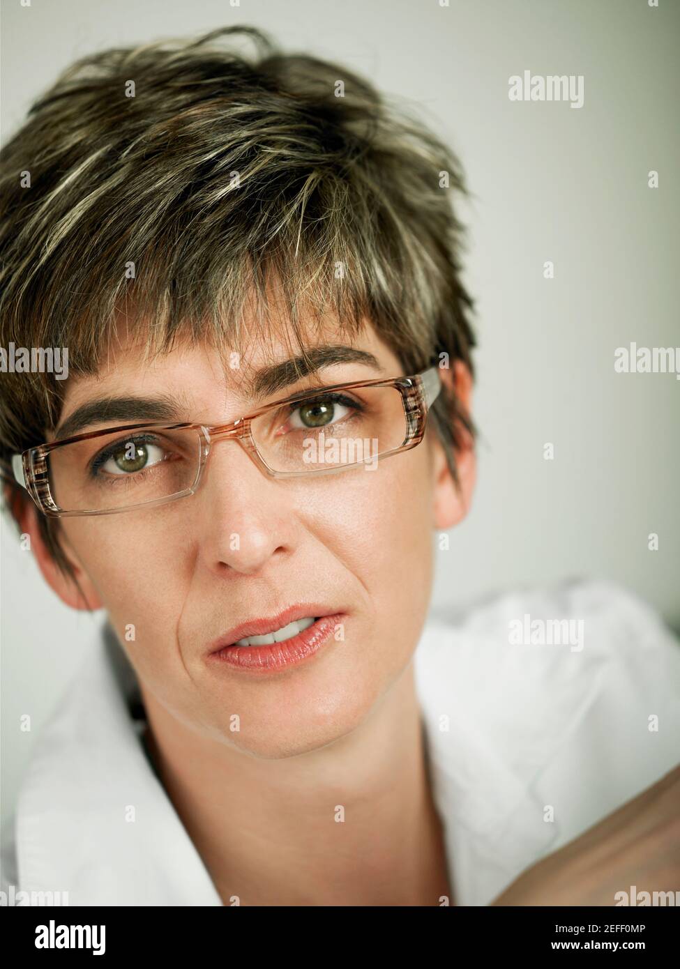 Mature woman button down shirt hi-res stock photography and images - Alamy