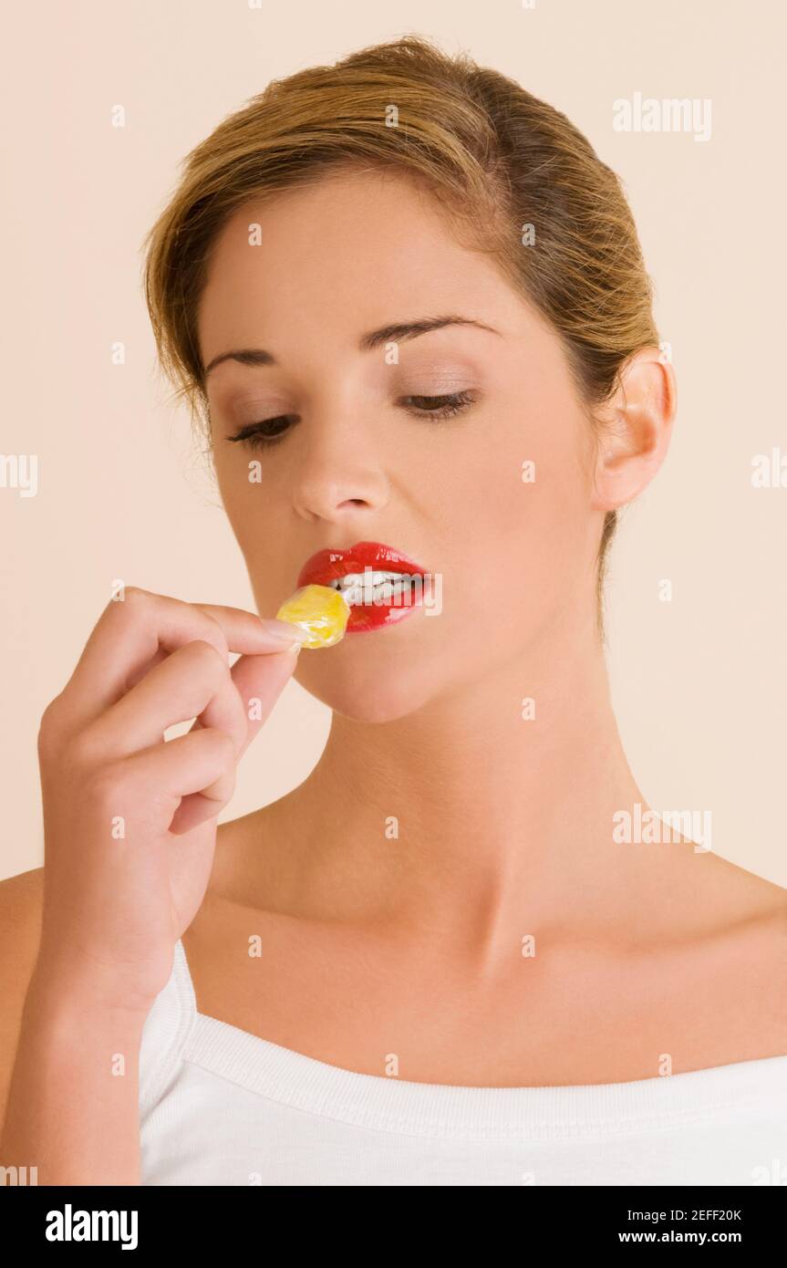 Woman candy wrapper hires stock photography and images Alamy
