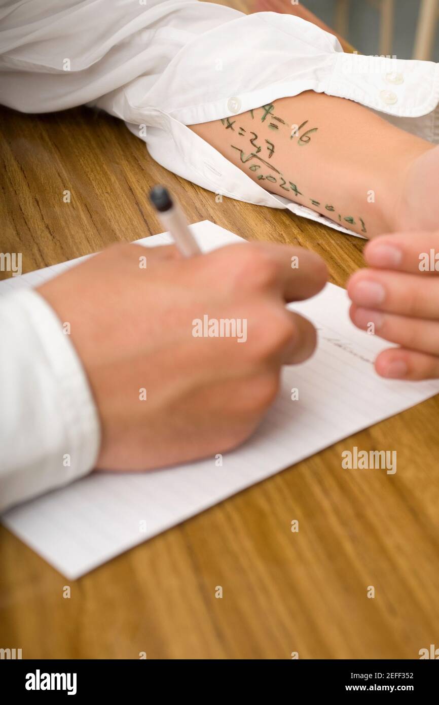 Close up of a student copying in an examination Stock Photo