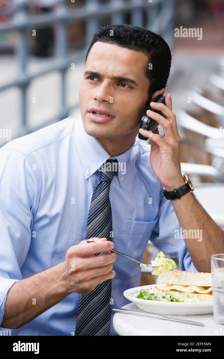 Mobile telephone during meal hires stock photography and images Alamy