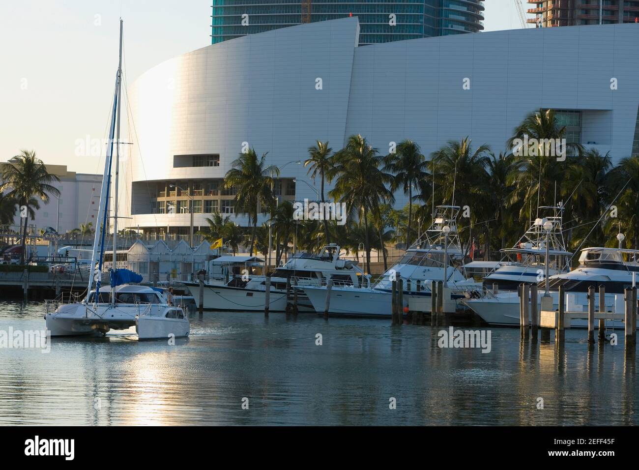 Boats moored at a dock Stock Photo - Alamy