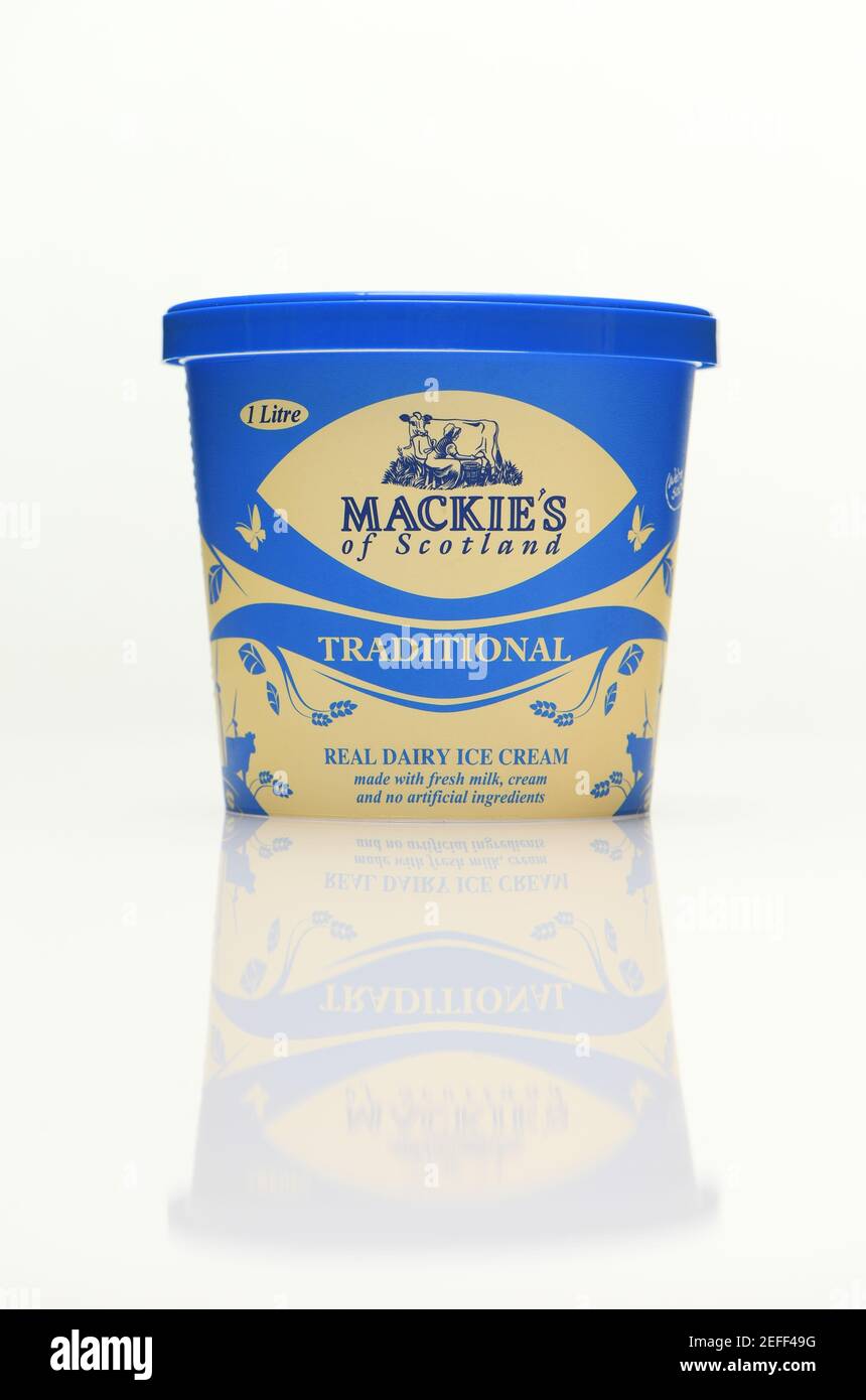 Mackies of Scotland traditional ice cream 1 litre carton on a white background with a reflection. Stock Photo