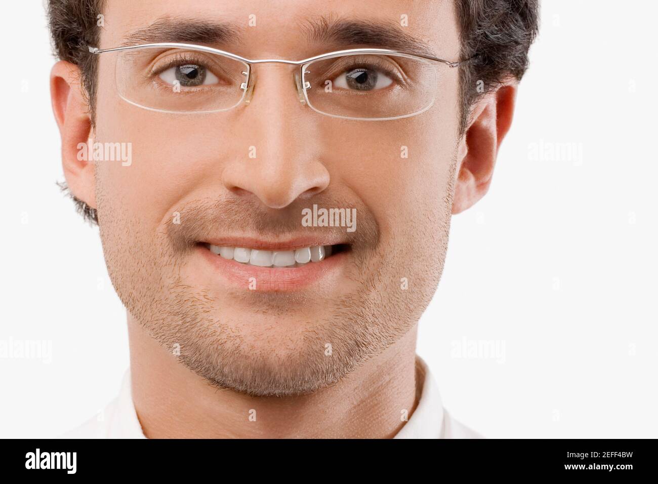 Portrait of a male doctor smiling Stock Photo - Alamy