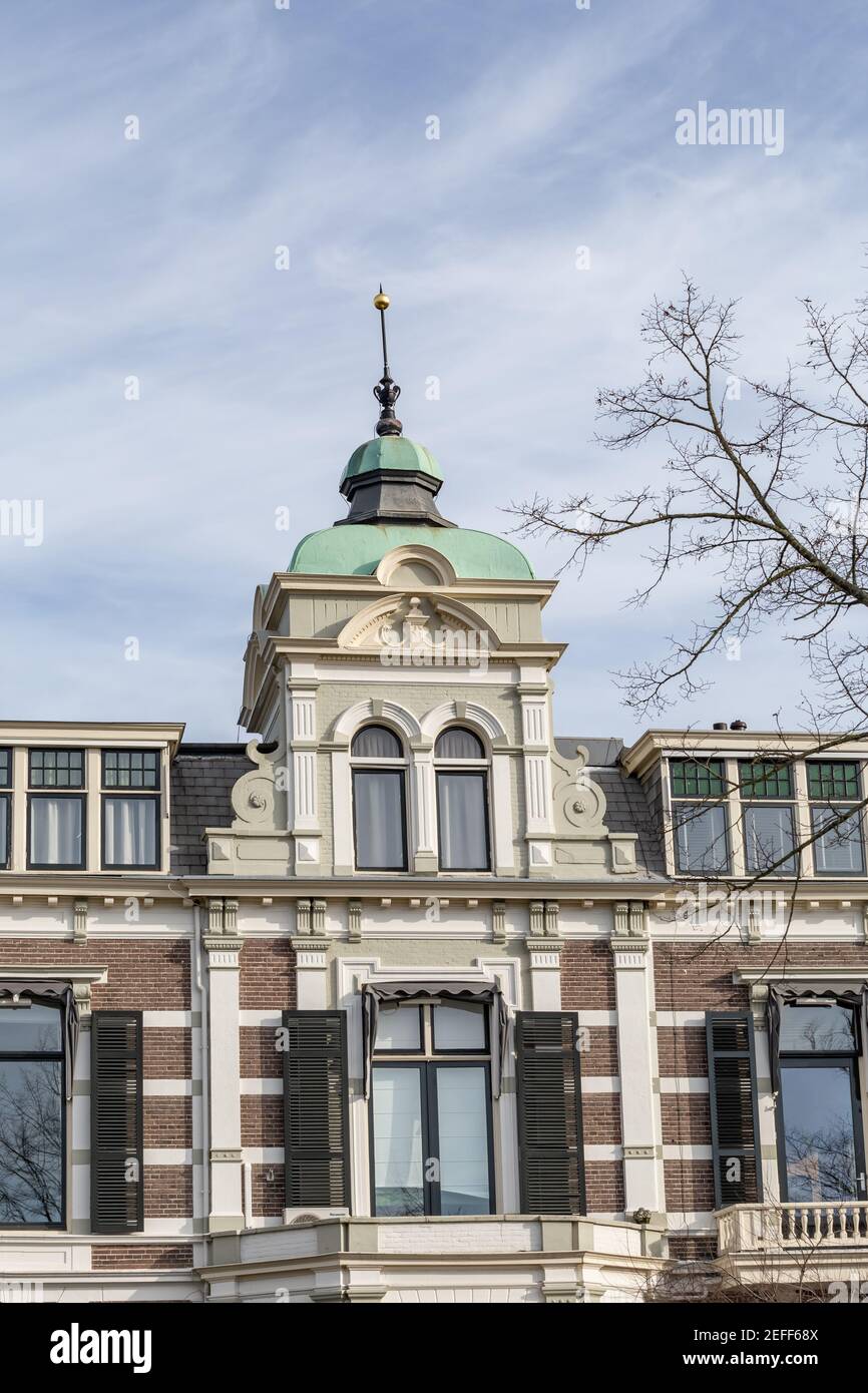 Dutch city Gable house with shutter windows and and tower in Deventer