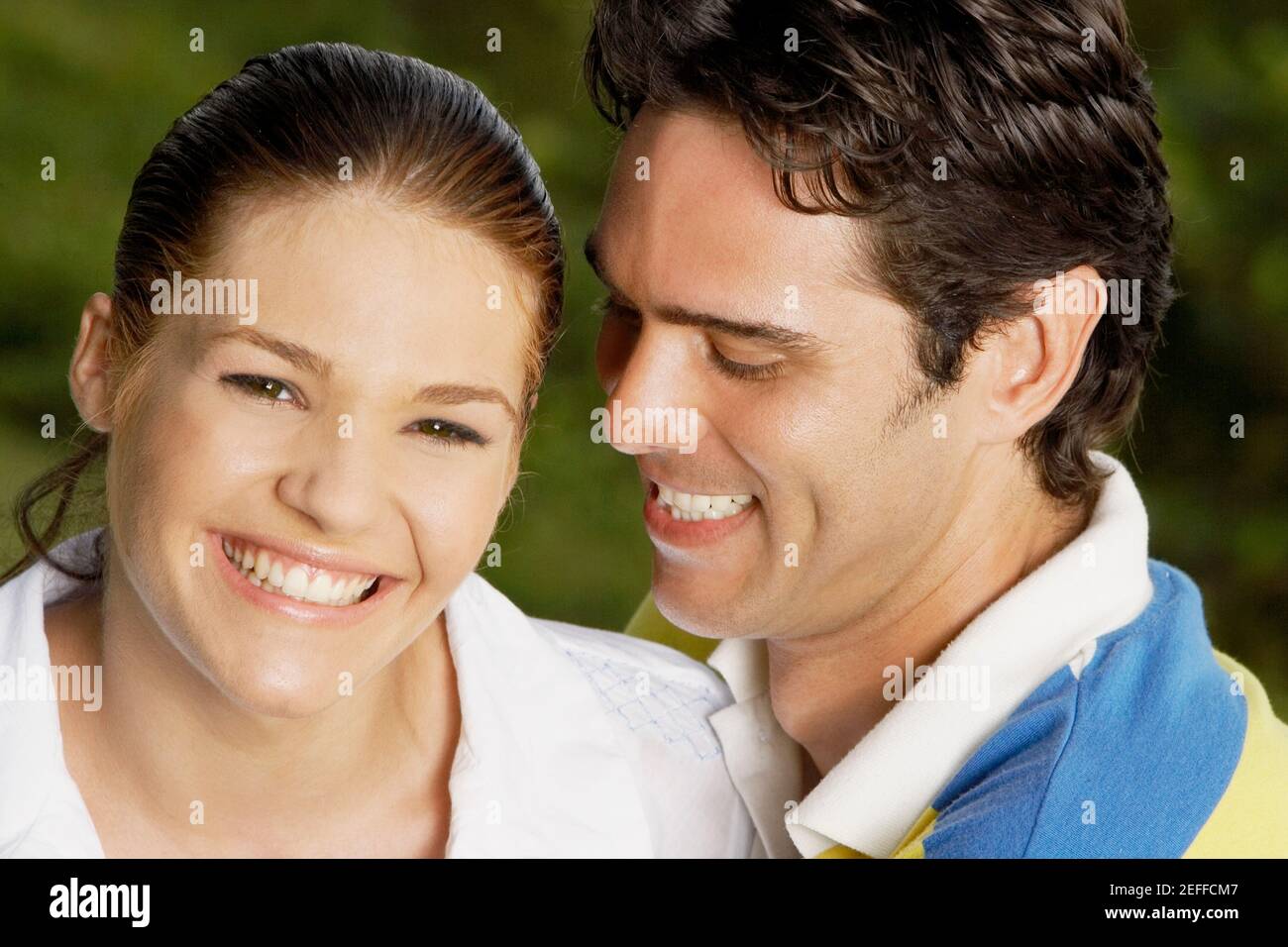 Portrait of a teenage girl and a young man smiling Stock Photo - Alamy