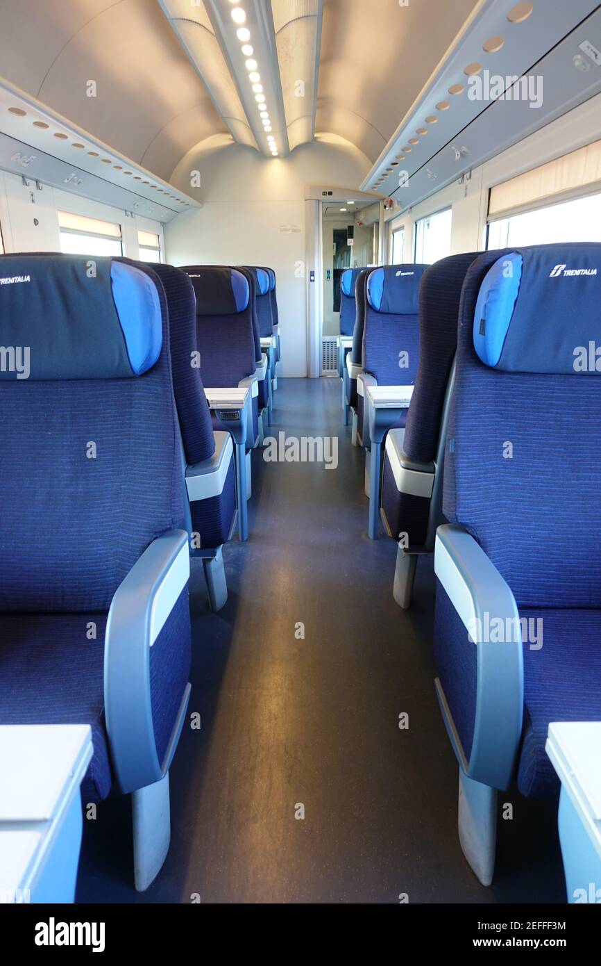 Rome, Italy - May 19, 2017:Empty train interior seats during travel. Euro star high speed train of Trenitalia major italian railway company. Stock Photo