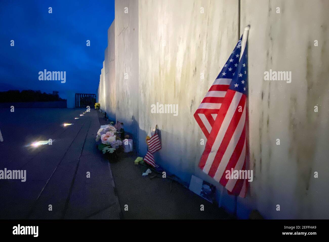 American flag against wall of names of those who died on Flight 93, Shanksville, PA Stock Photo