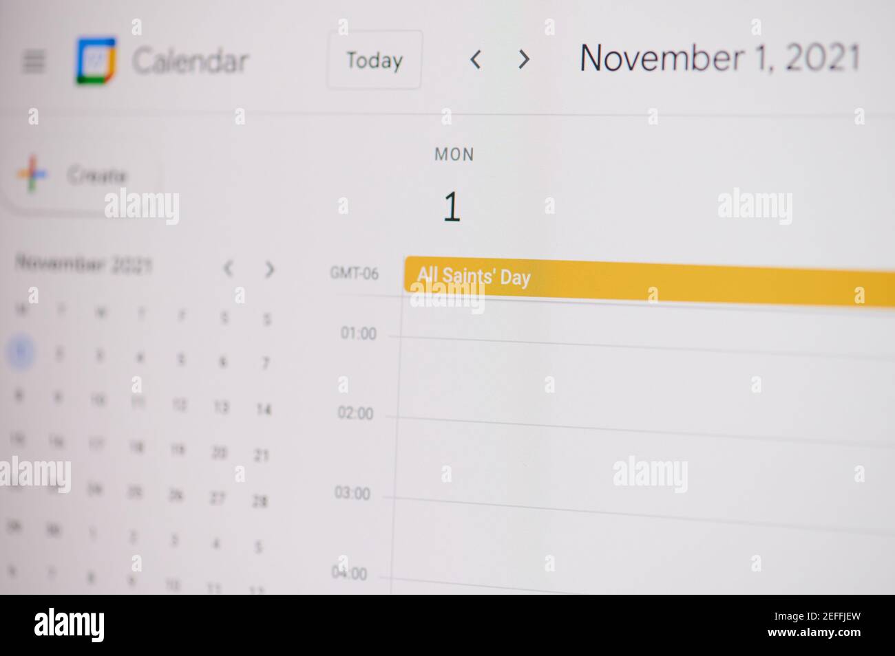 New york, USA - February 17, 2021: All saint day 1 of november  on google calendar on laptop screen close up view. Stock Photo