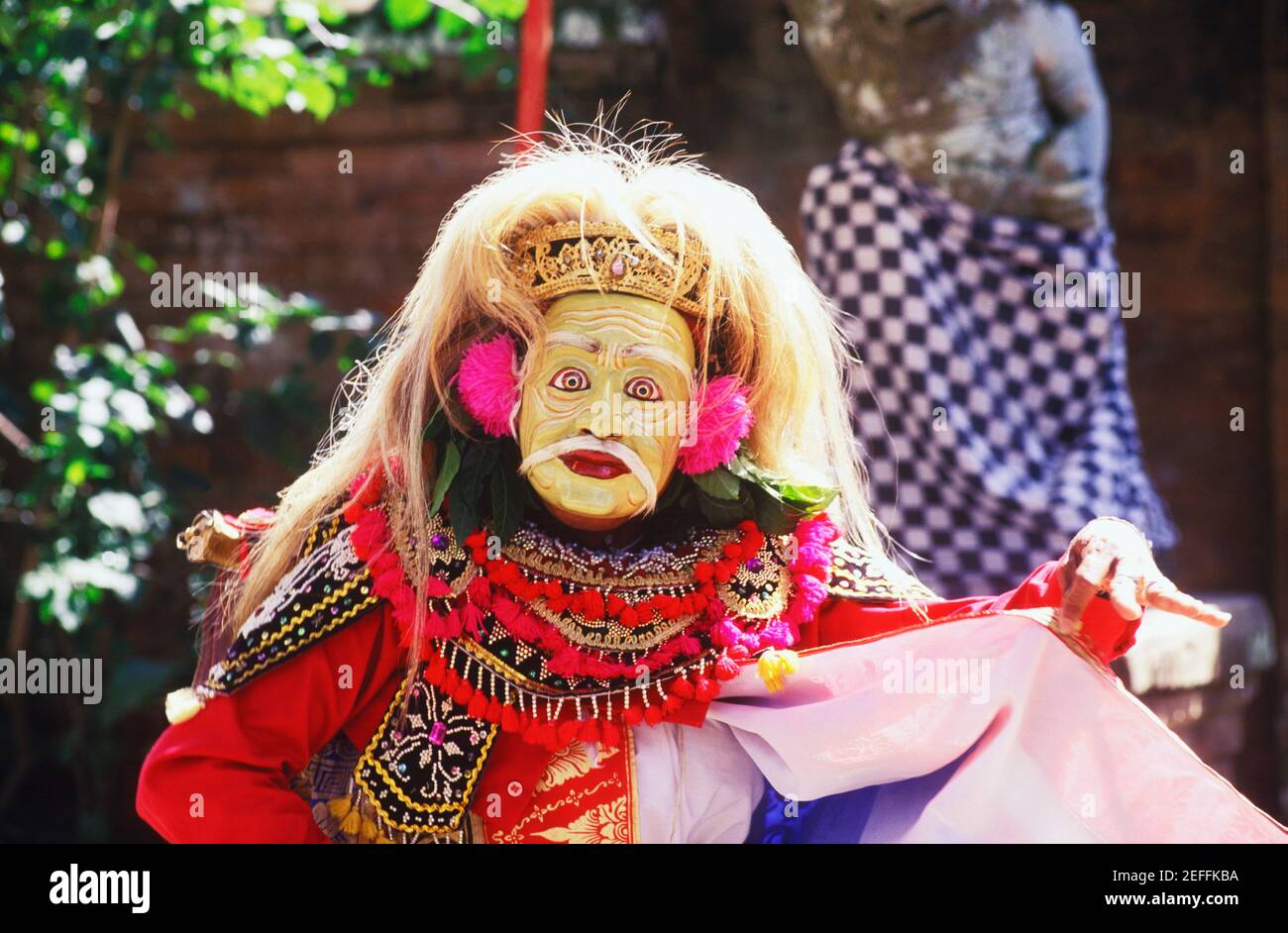 Close-up of a stage performer dancing, Bali, Indonesia Stock Photo