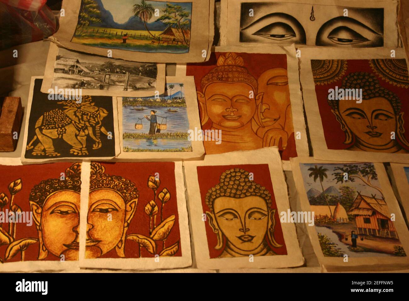 Close-up of posters and paintings, Night Market, Luang Prabang, Laos Stock Photo