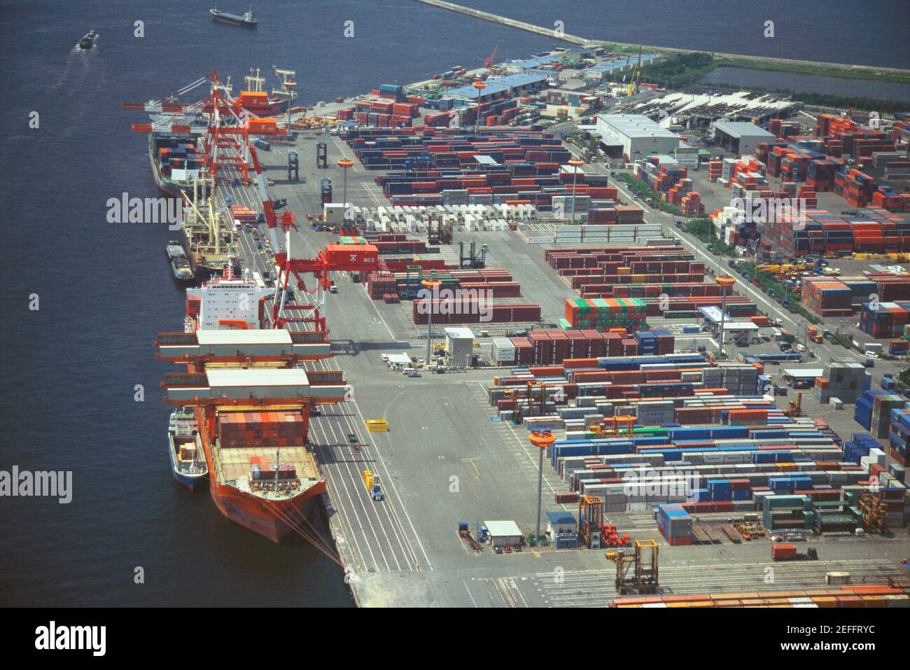 Aerial view of industrial ships at a commercial dock, Nanko Port Town