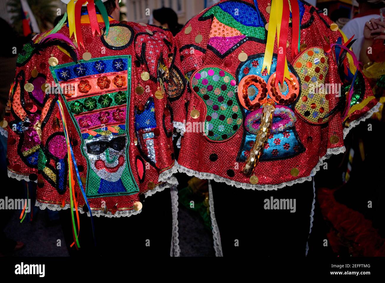 Mid section view of two men wearing costumes Stock Photo - Alamy