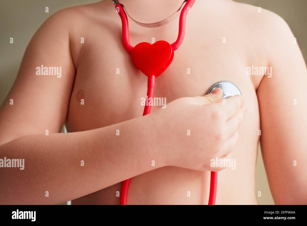 Boy Check Heart by Stethoscope Toy Stock Photo