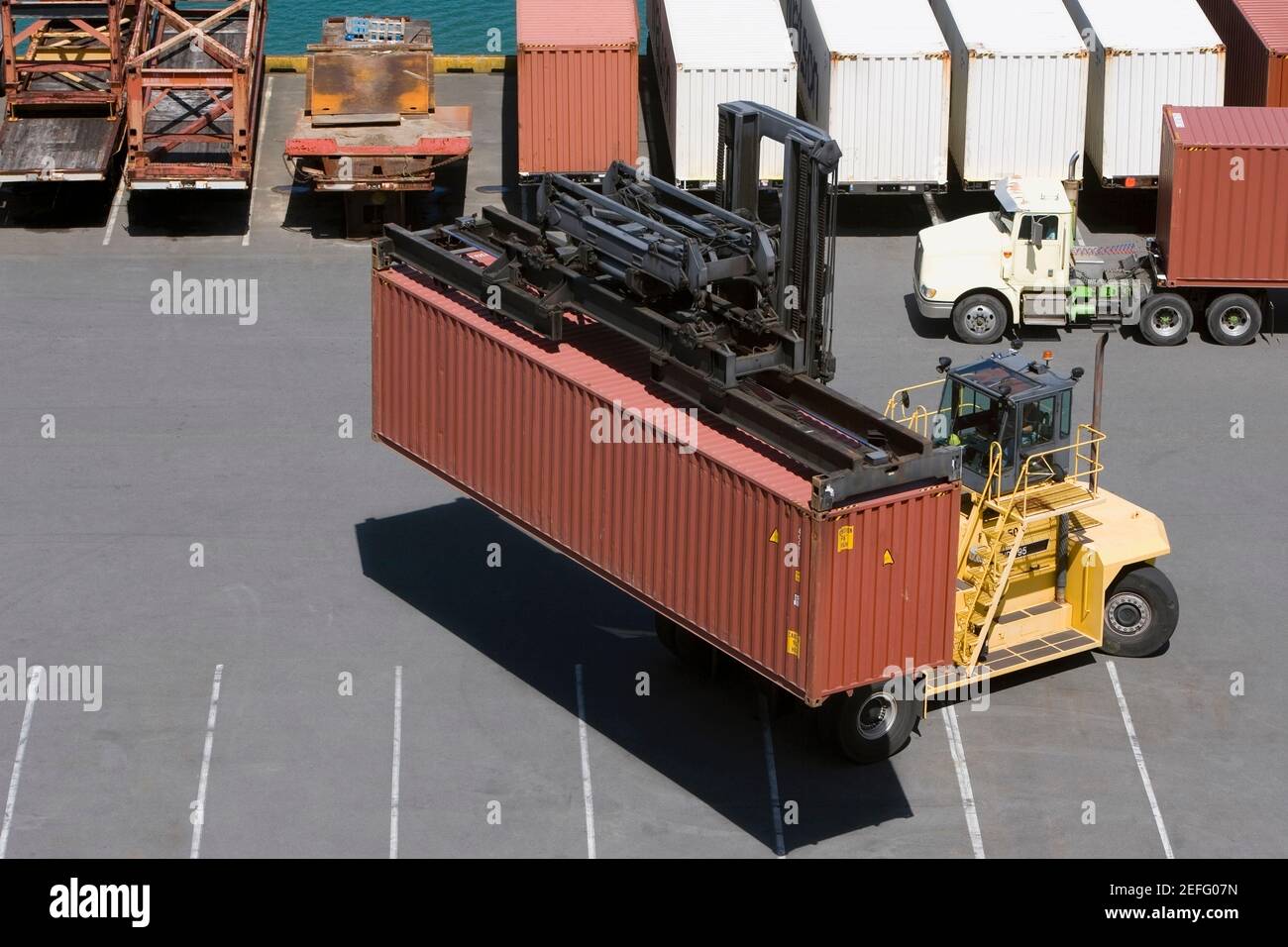 Cargo container truck picking hires stock photography and images Alamy