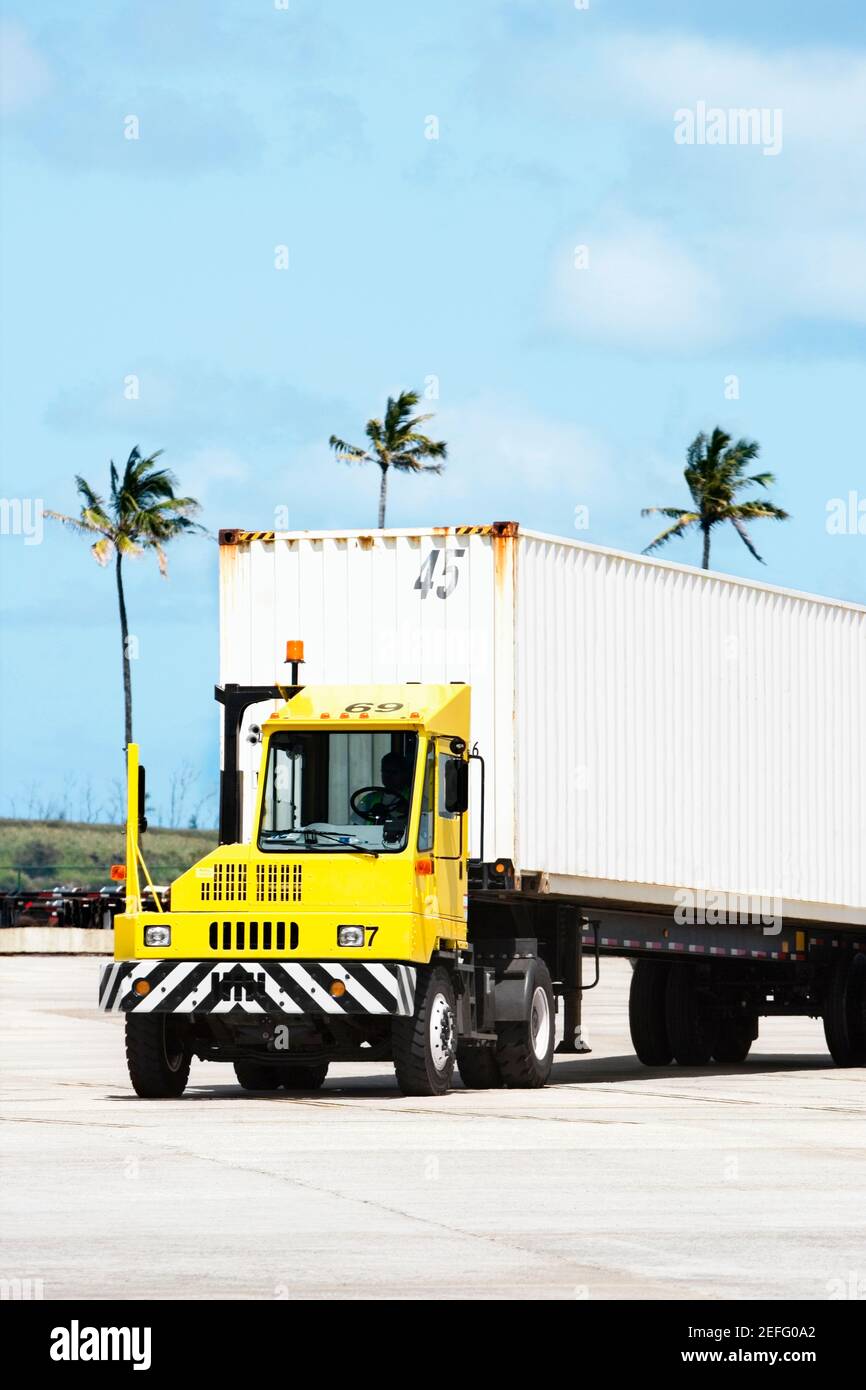 Truck driver driving a semitruck, Nawiliwili Beach Park, Kauai, Hawaii
