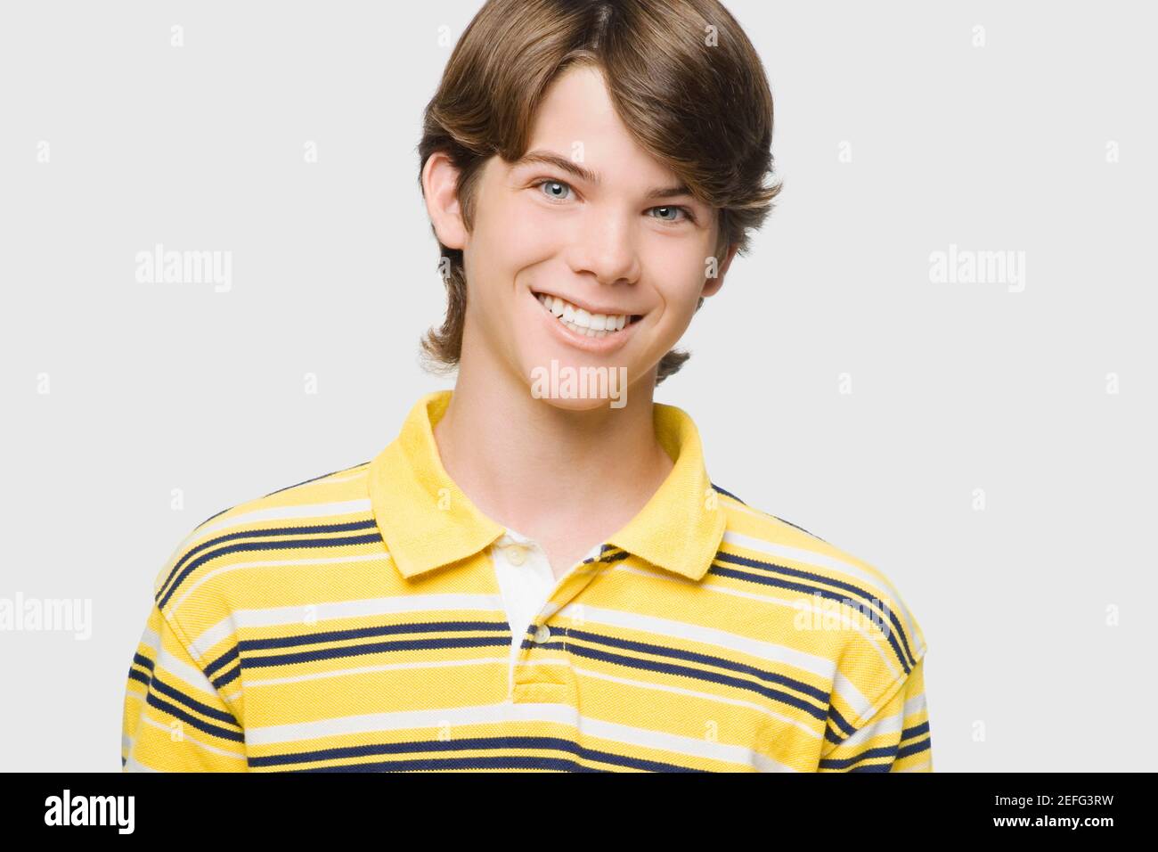 Portrait of a teenage boy smiling Stock Photo - Alamy