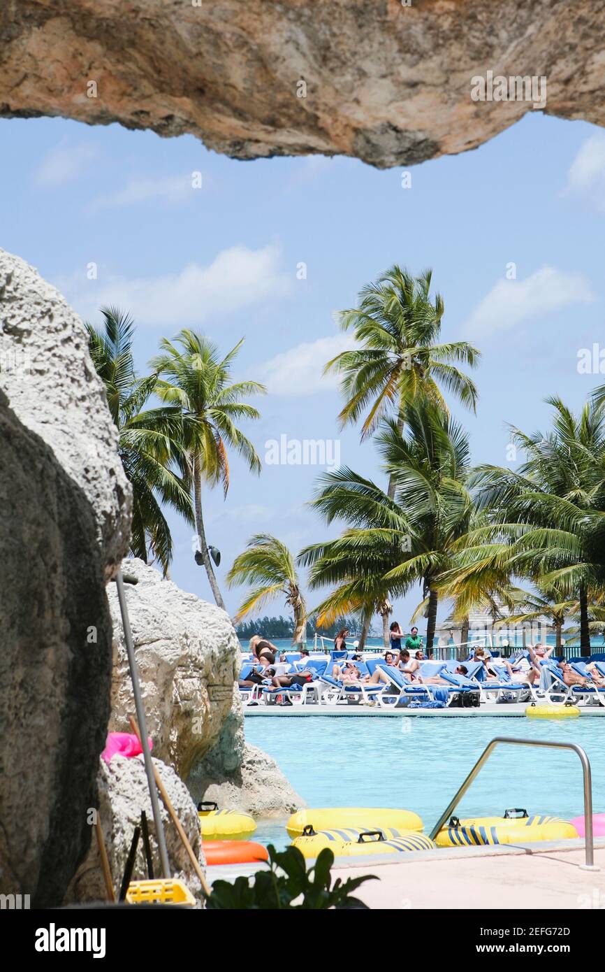 Tourists relaxing in a tourist resort, Cable Beach, Nassau, Bahamas