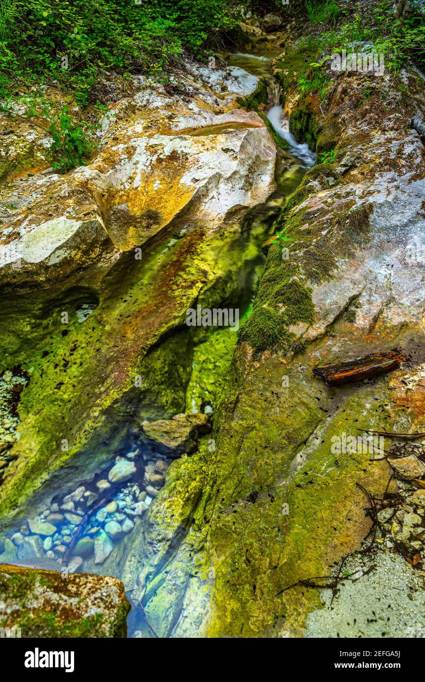 The strength of the mountain stream carved out the rocks of the mountain. Maiella National Park, Abruzzo, Italy, Europe Stock Photo