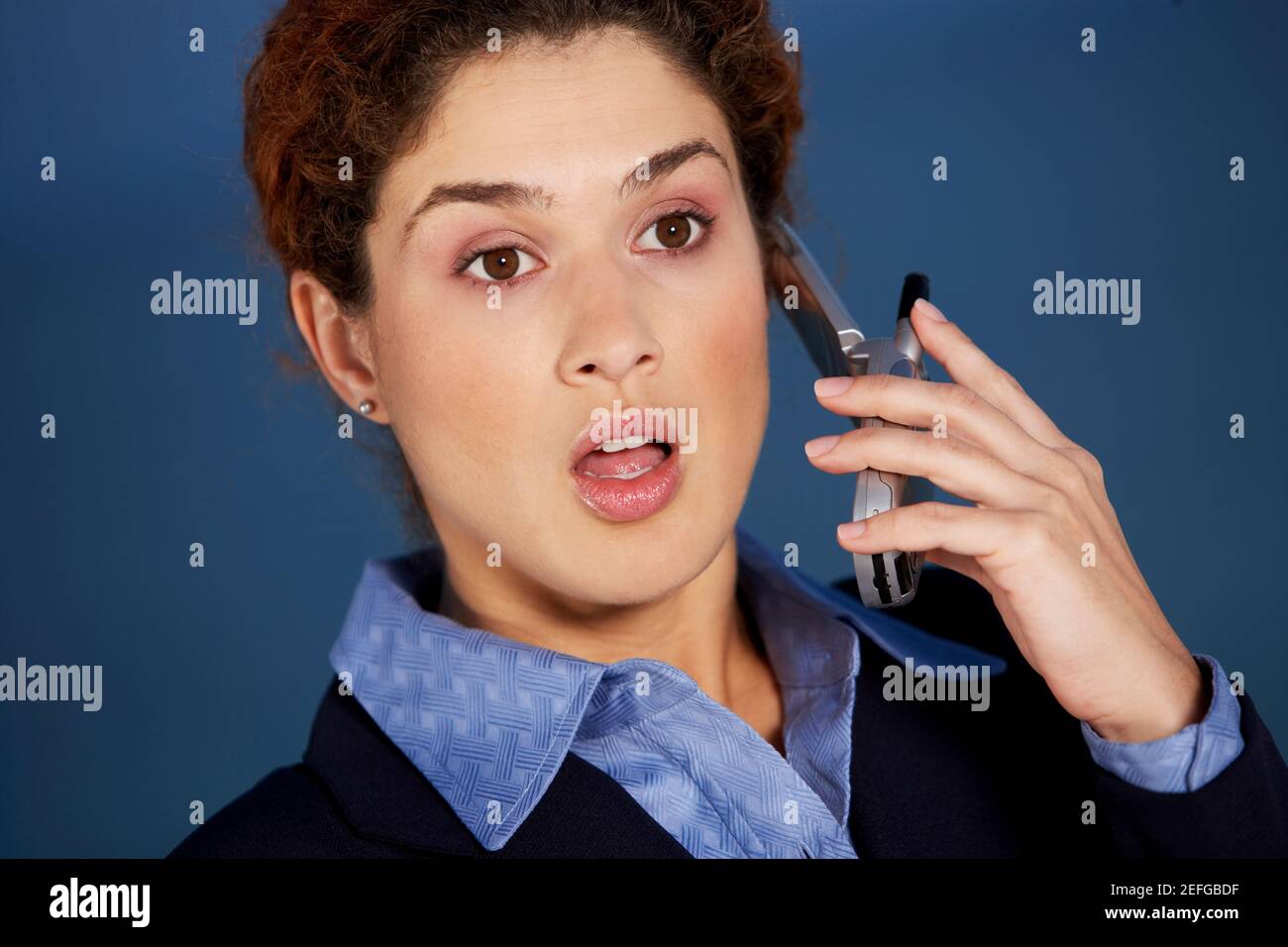 Close-up of a businesswoman talking on a mobile phone Stock Photo