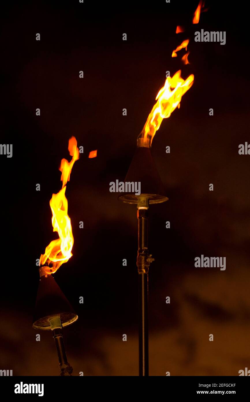 Flame burning from tiki torches Stock Photo Alamy