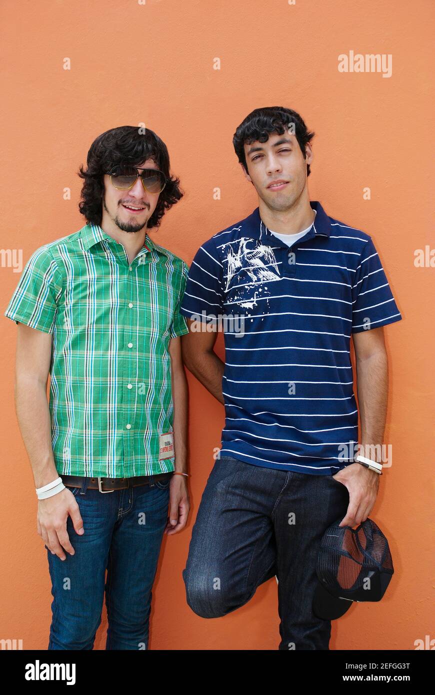 Portrait of two young men standing together Stock Photo