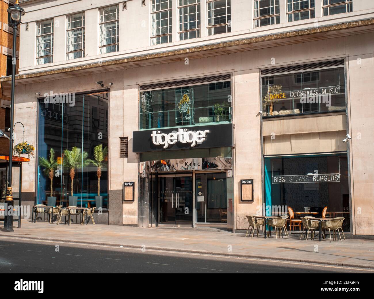 London, England - March 17, 2020: Tiger Tiger Restaurant on the Haymarket in London's West End is empty due to Coronavirus and Lockdown Stock Photo