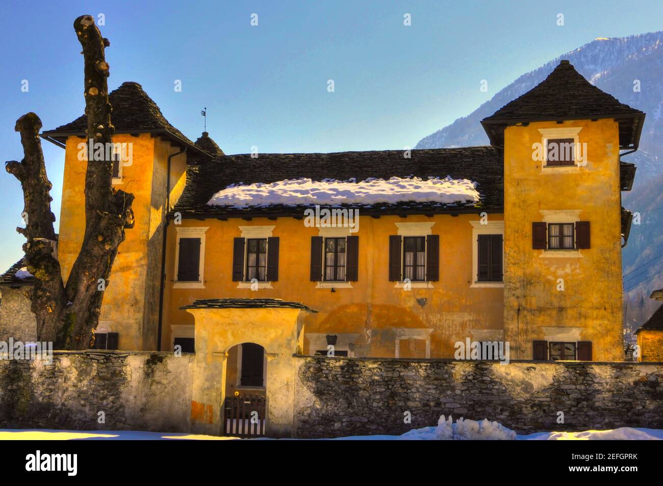 Rustic Castle in Brione in Valley Verzasca in a Sunny Winter Day in Ticino, Switzerland. Stock Photo