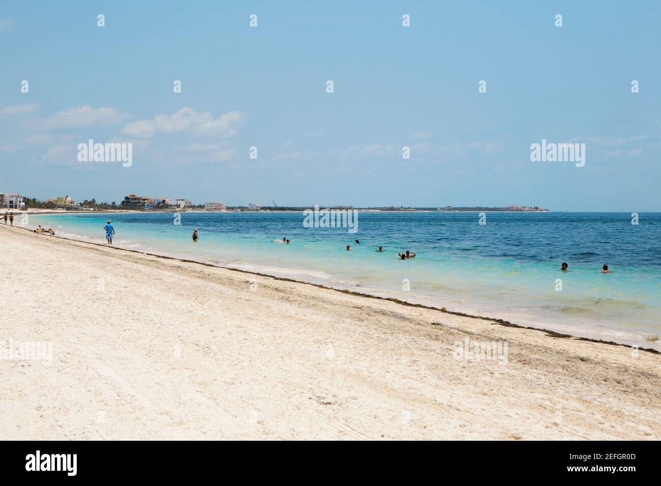 Tourists on the beach, Cancun, Mexico Stock Photo