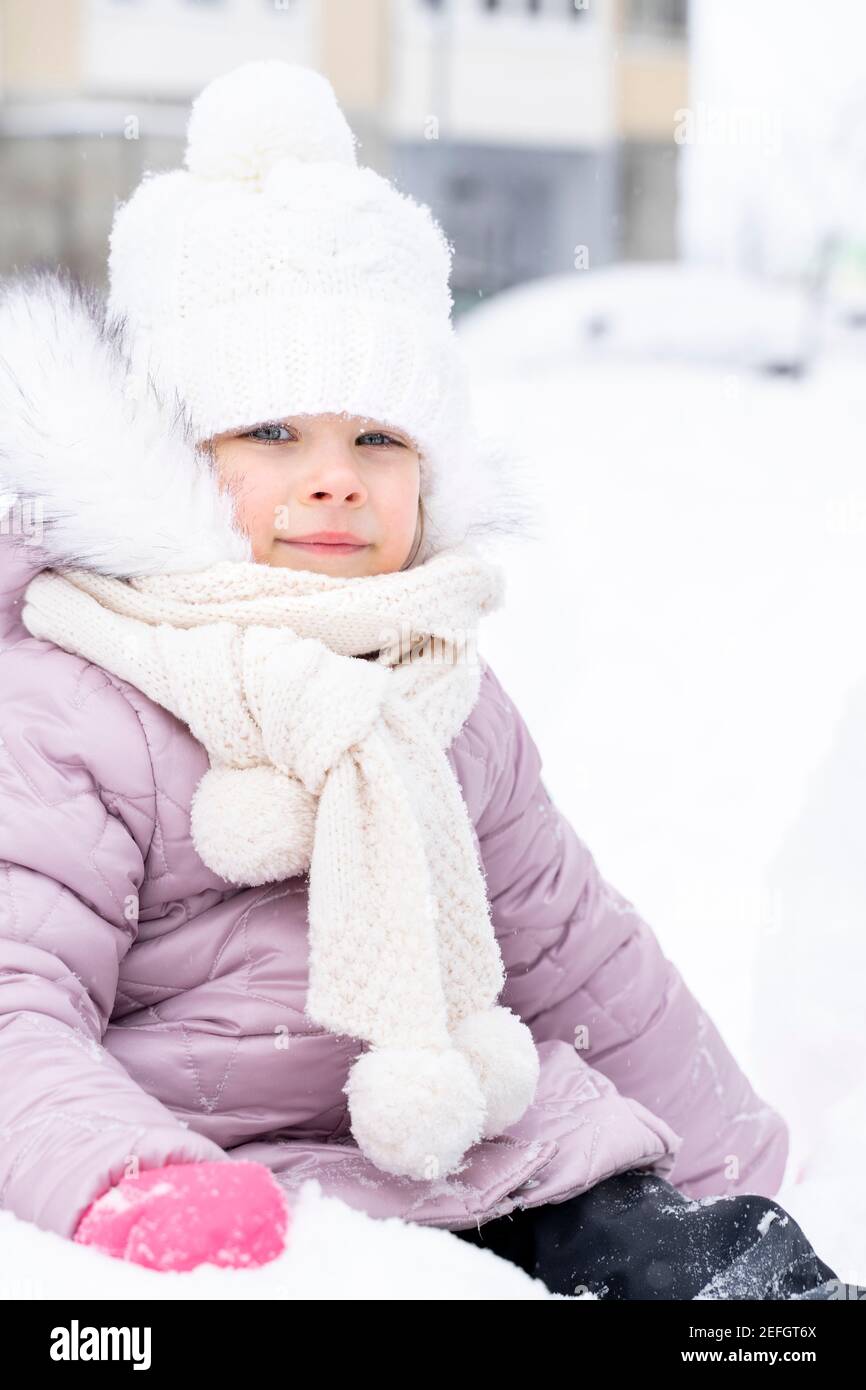 Little girl wearing pink coat hi-res stock photography and images - Alamy