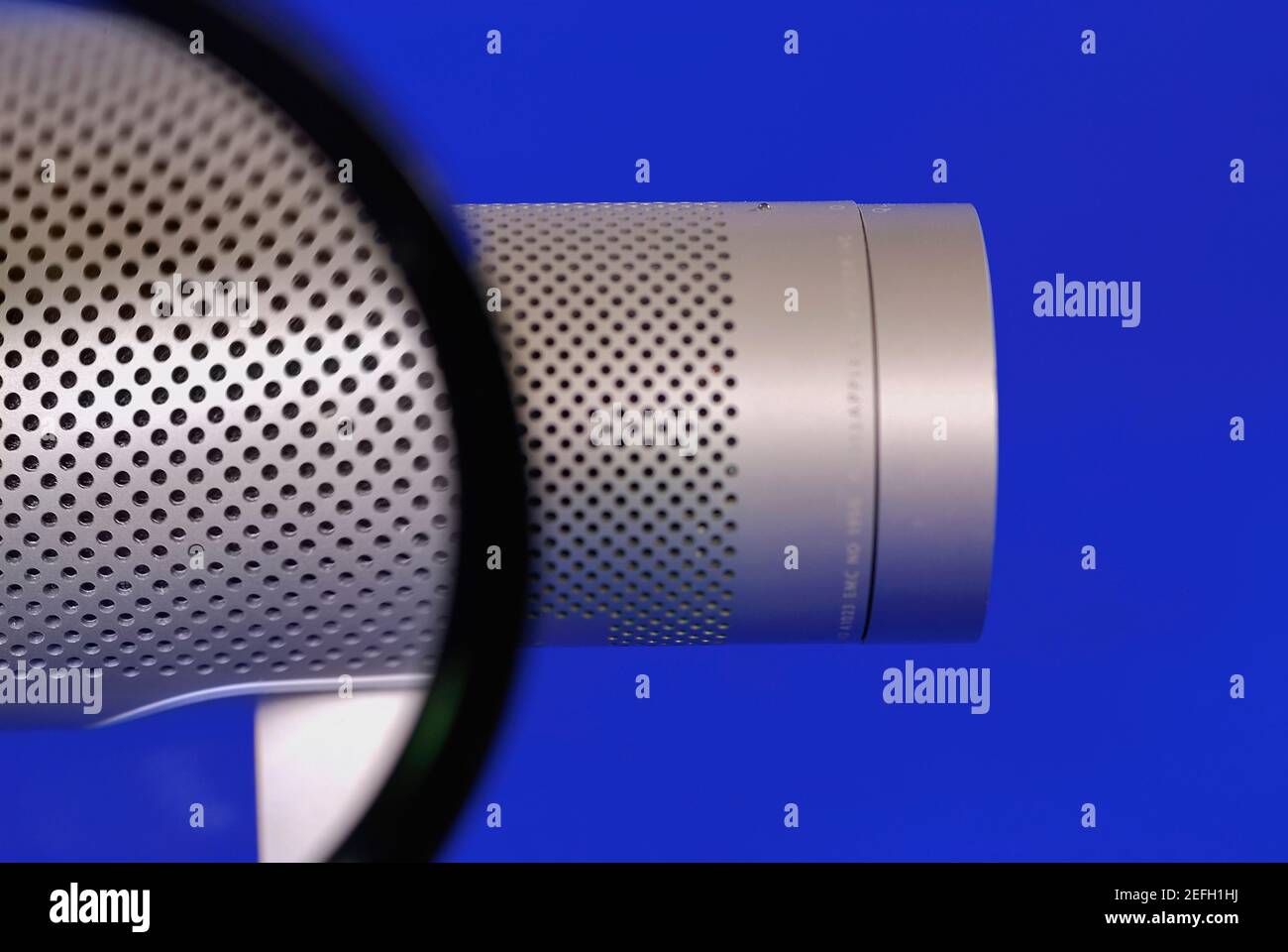 Close up of holes on a metal cylinder seen through a magnifying glass Stock  Photo - Alamy