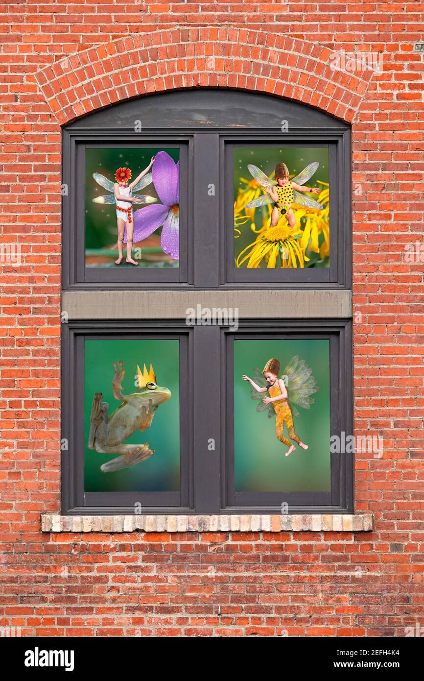 A child's fairyland reflected in a bricked in window. Stock Photo