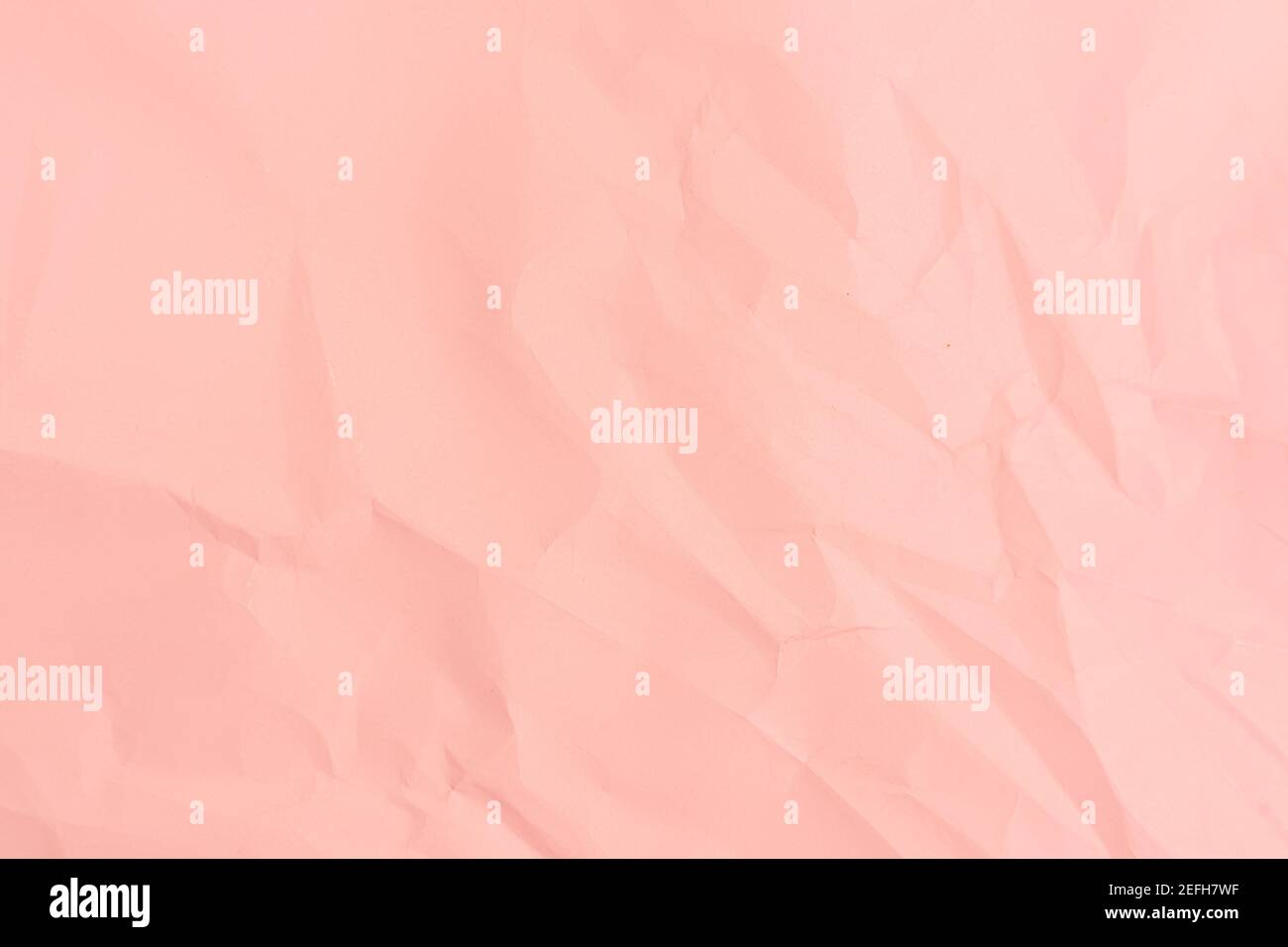 Pink paper background. Crumpled pink paper texture. Stock Photo