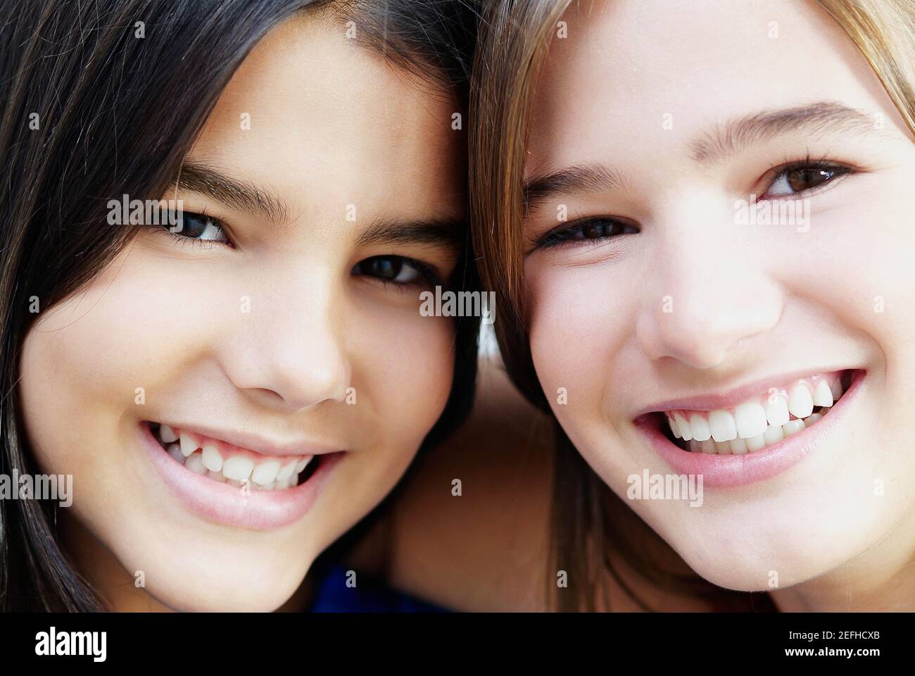 Portrait of two girls smiling Stock Photo