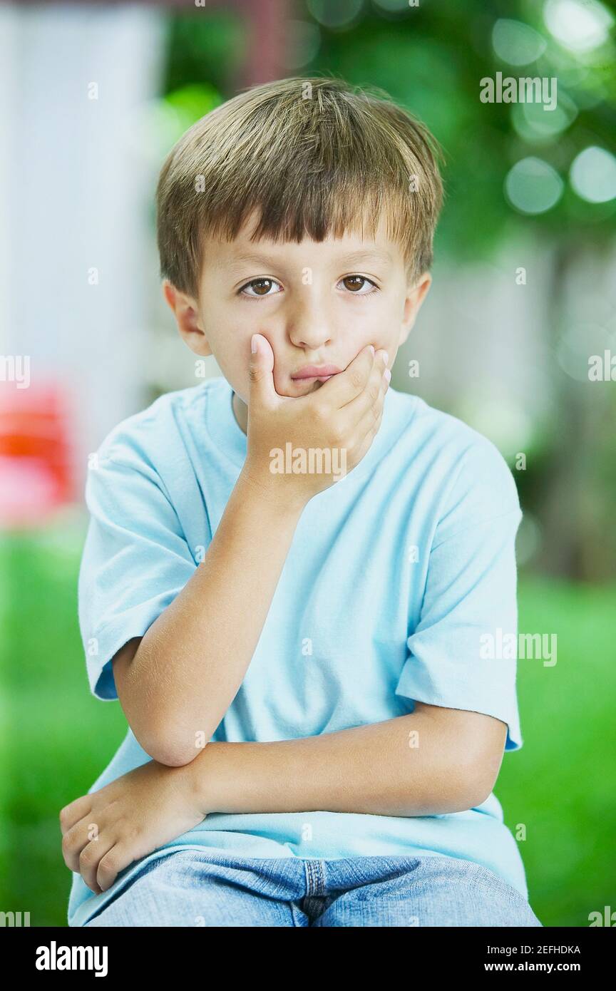 Portrait of a boy looking sad Stock Photo