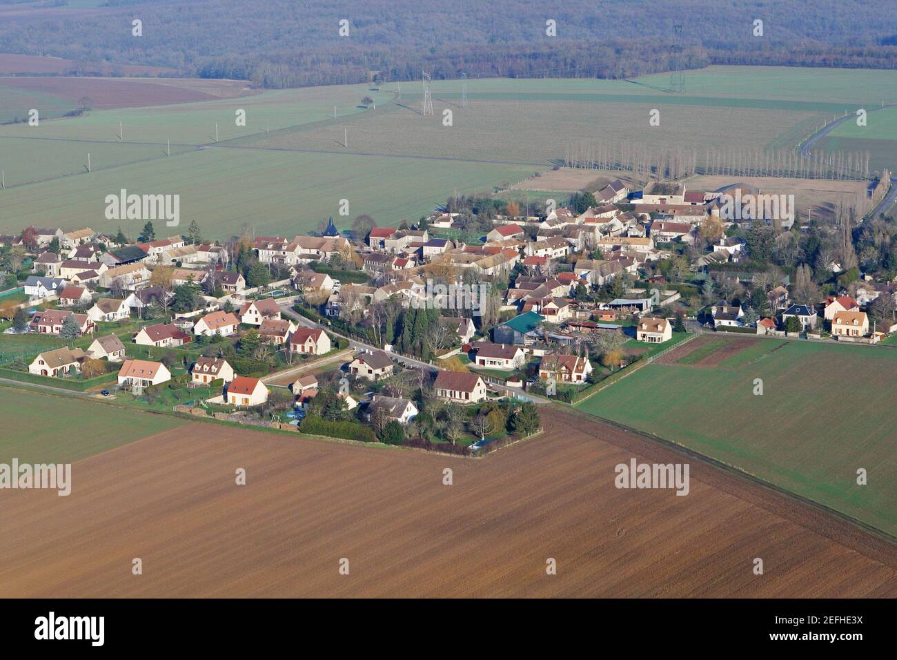 Aerial view of  Boinvilliers village in the middle of the fields in the Yvelines department (78200), Ile-de-France region, France - January 03, 2010 Stock Photo