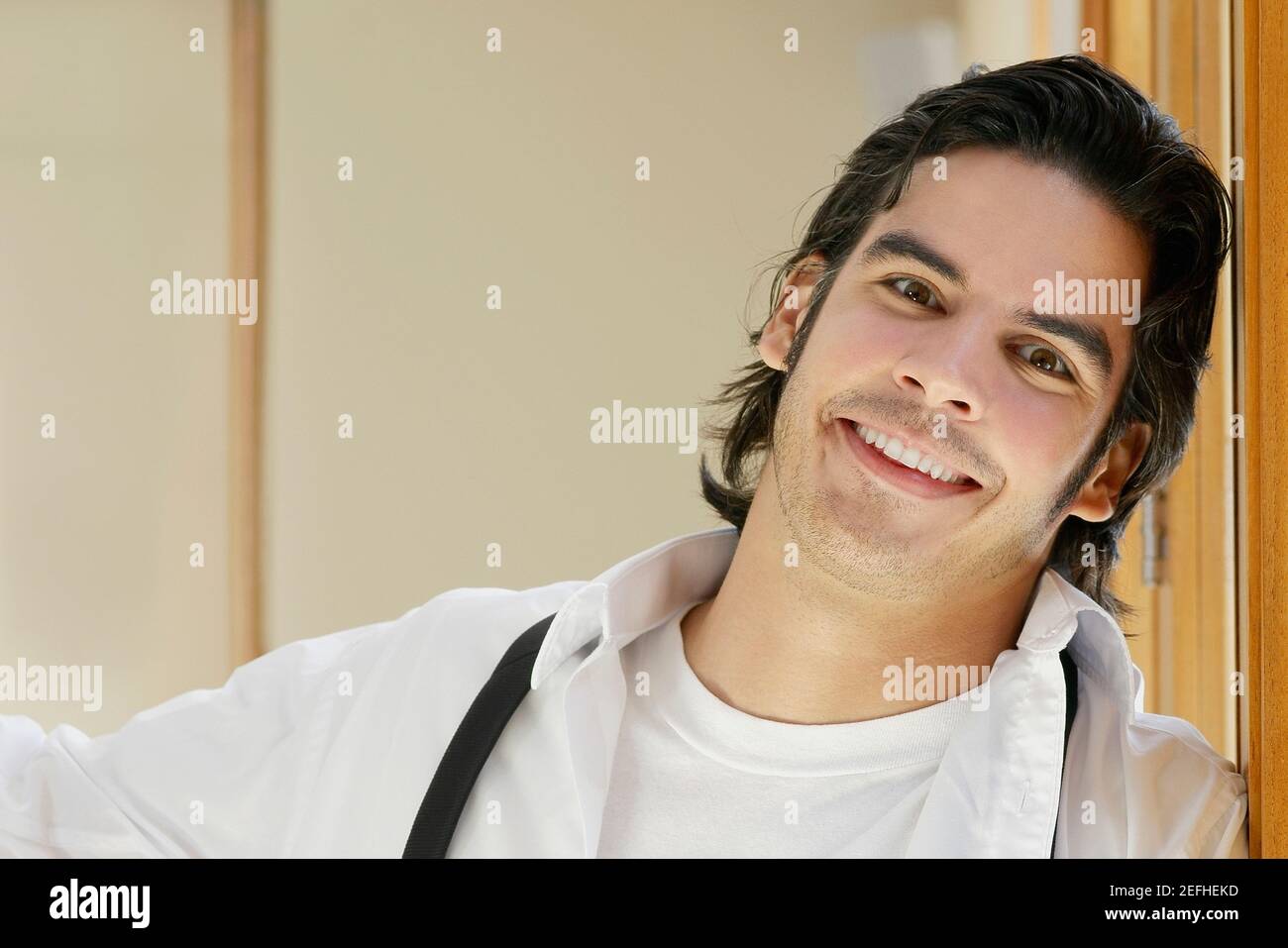 Portrait of a young man smiling Stock Photo - Alamy