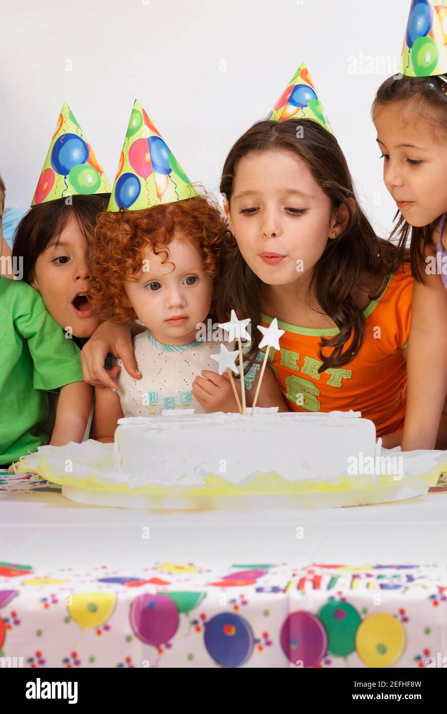 Group of children celebrating a birthday party Stock Photo