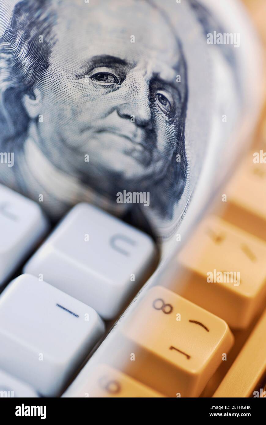 Close up of one hundred dollar bill on a computer keyboard Stock Photo ...