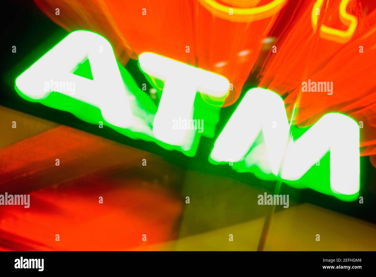 Neon sign of an ATM machine Stock Photo - Alamy