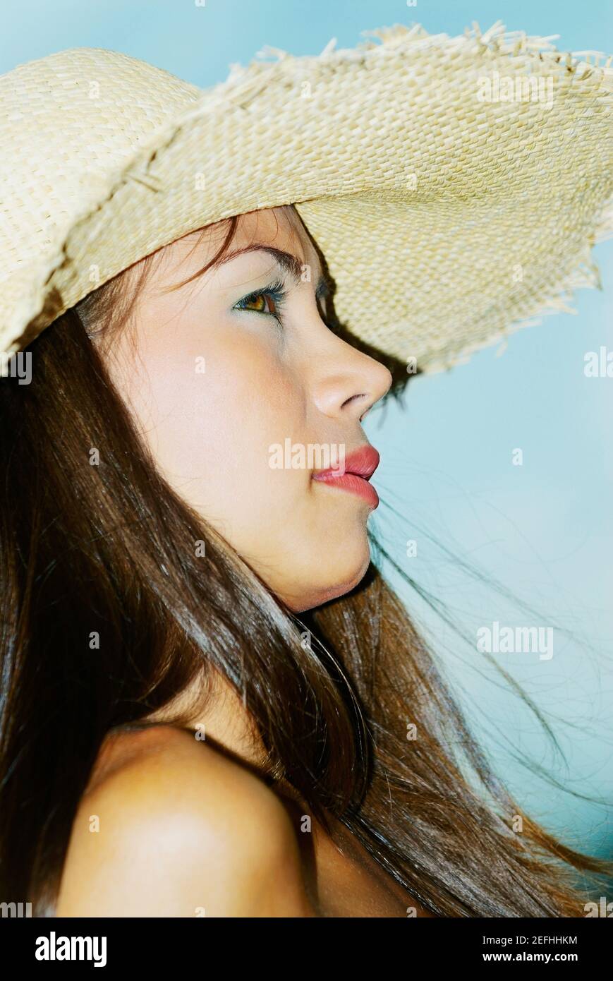 Woman wearing a sunhat hi-res stock photography and images - Alamy