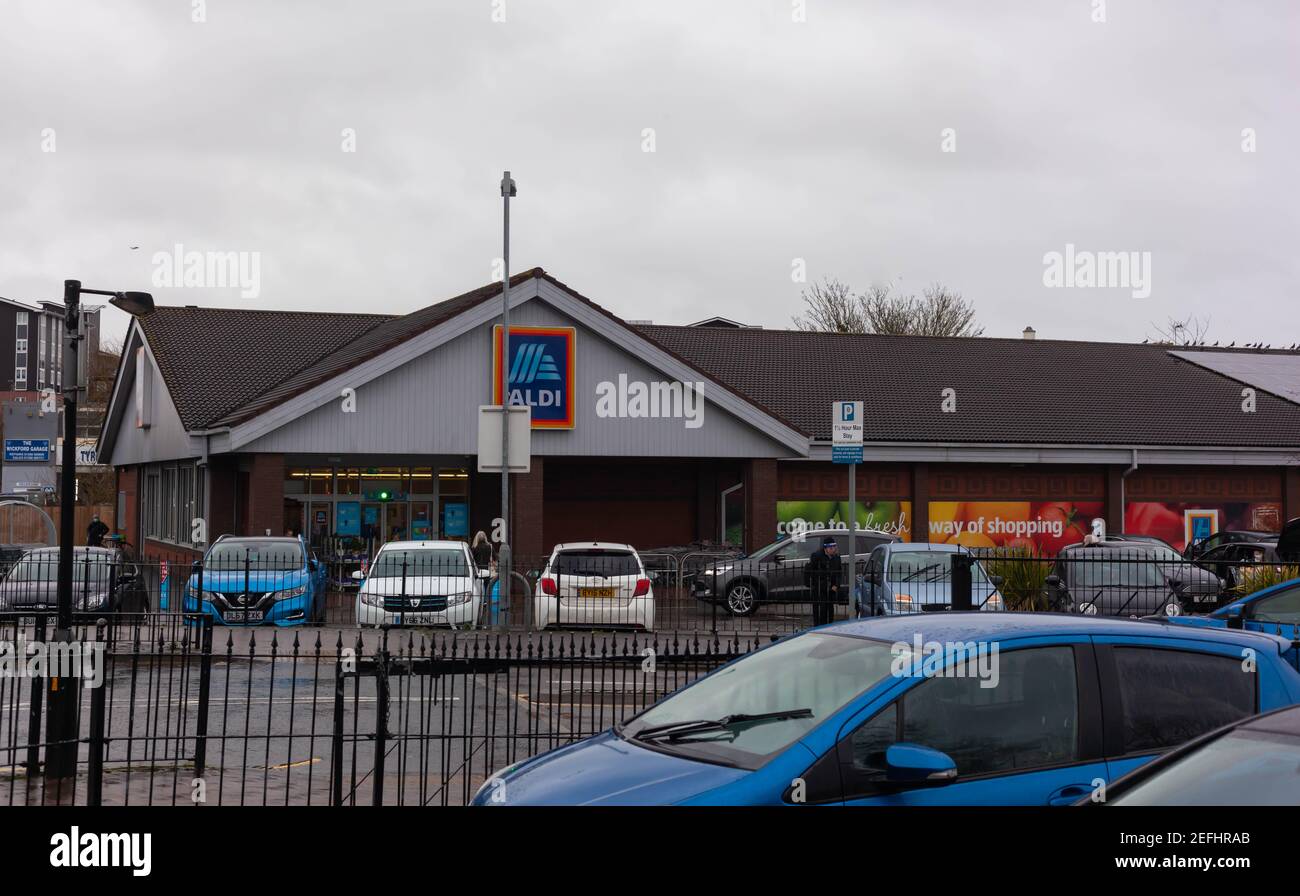 Exterior of Aldi Supermarket building, on a an overcast day