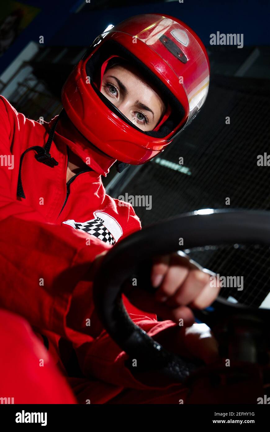 Portrait of a female go cart racer sitting in a sports car Stock Photo ...