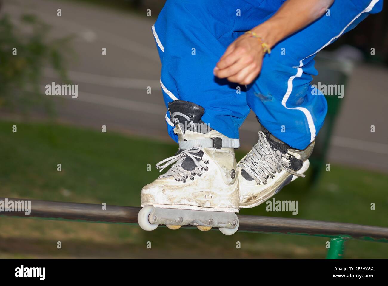 Low section view of a man inline skating Stock Photo Alamy