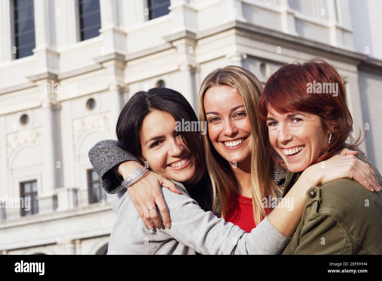 Women hugging 35 years hi-res stock photography and images - Alamy