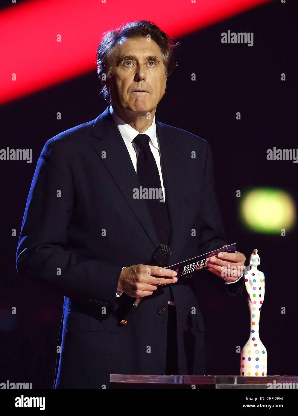 London, UK.  20th February 2013. Brian Ferry of Roxy Music accepts the Brit Award for British Album of the Year during the 2013 Brit Awards Show, 02 Arena, London. Stock Photo