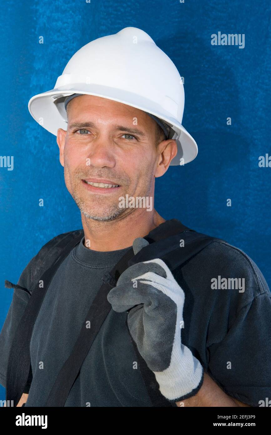 Close-up of a male construction worker smiling Stock Photo
