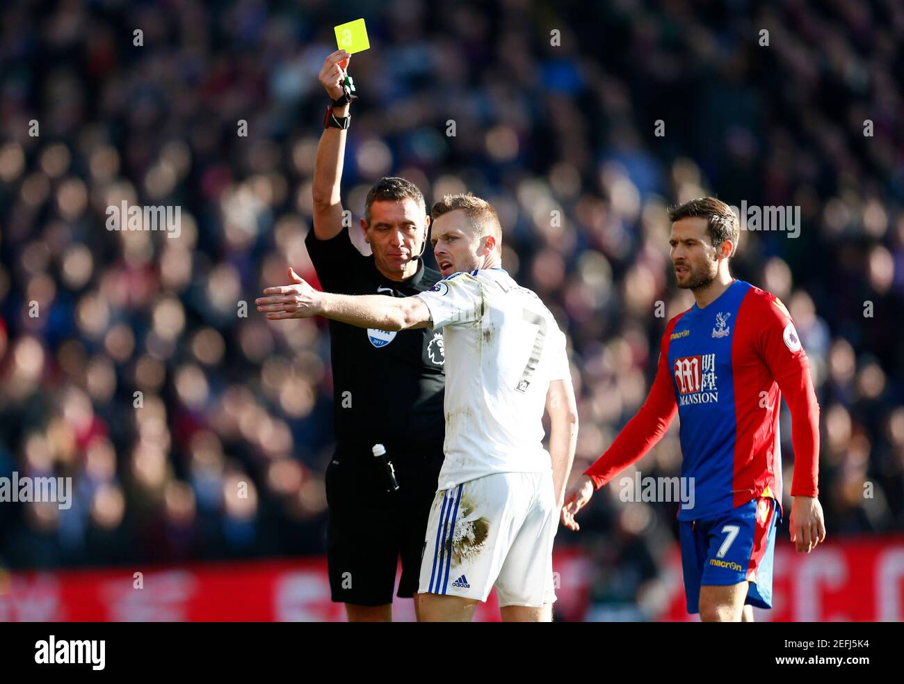 Britain Football Soccer - Crystal Palace v Sunderland - Premier League - Selhurst Park - 4/2/17 Sunderland's Sebastian Larsson is shown a yellow card by referee Andre Marriner Reuters / Andrew Winning Livepic EDITORIAL USE ONLY. No use with unauthorized audio, video, data, fixture lists, club/league logos or 'live' services. Online in-match use limited to 45 images, no video emulation. No use in betting, games or single club/league/player publications.  Please contact your account representative for further details. Stock Photo